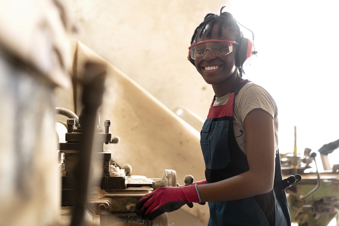 carpenter-cutting-mdf-board-inside-workshop